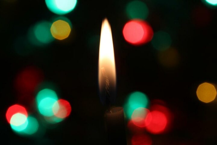 Christmas candle with bokeh effect